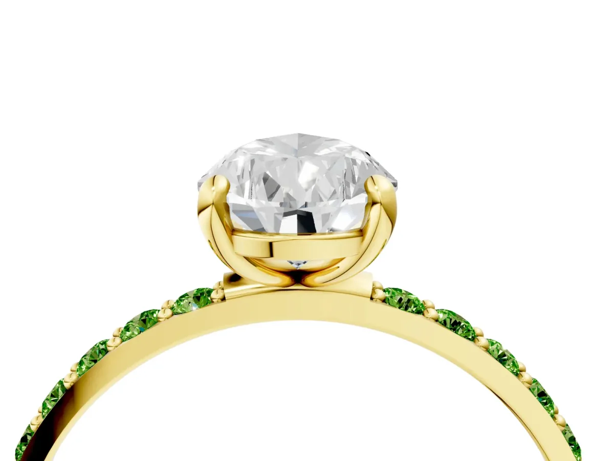Pear Cut Diamond Solitaire Ring with Round Peridot Pavé Band and Prong Setting Yellow gold