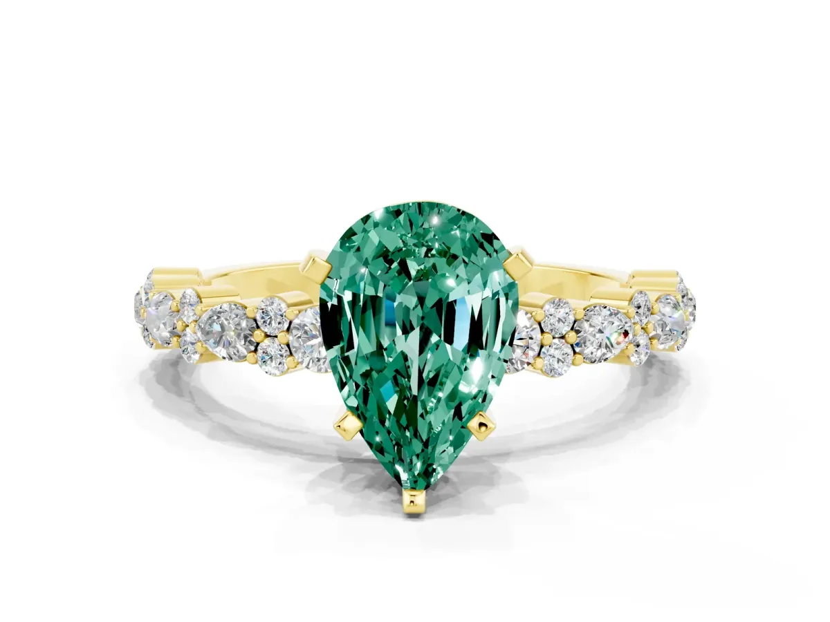 Pear Cut Green Sapphire Side Stone Solitaire Ring with Round and Four-Prong Setting Yellow gold