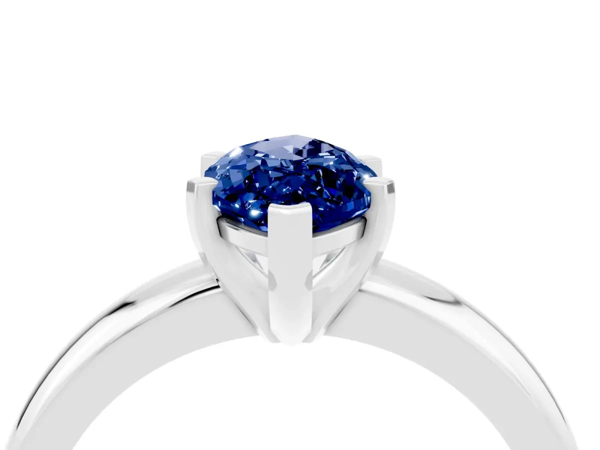 Marquise Cut Blue Sapphire Solitaire Engagement Ring with Round Band and Four-Prong Setting Silver