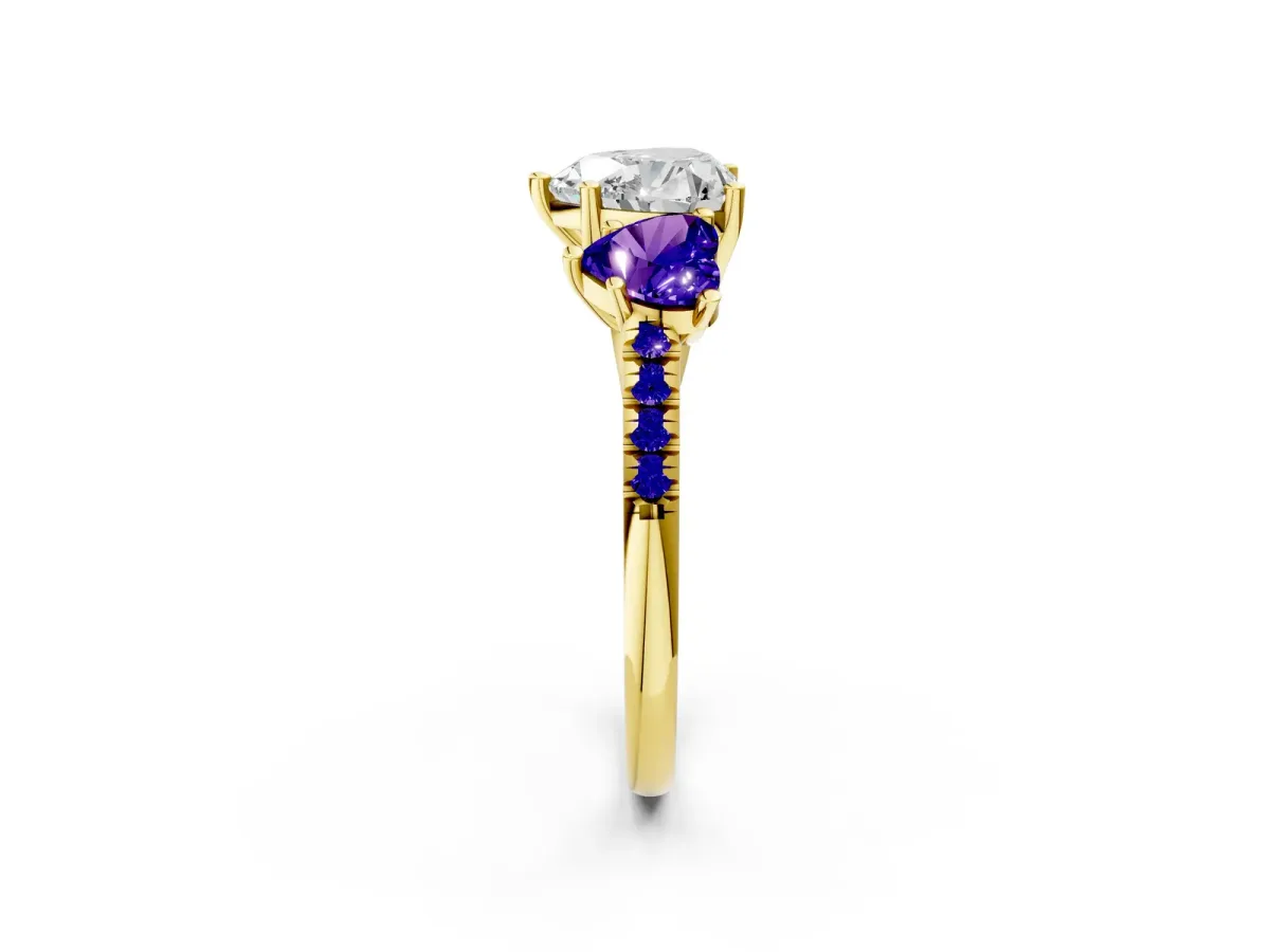 Three-Stone Heart Cut Diamond Ring with Round Tanzanite Pavé Band and Prong Setting Yellow gold
