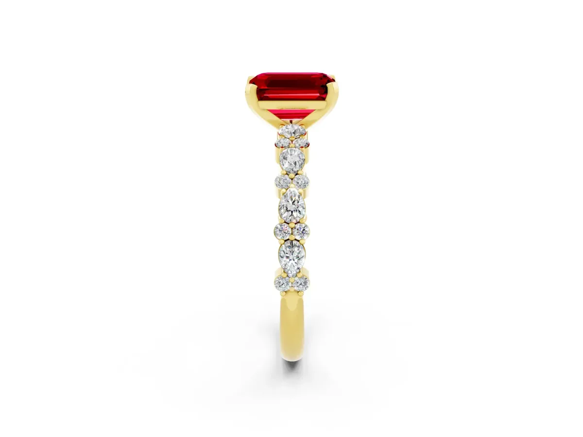 Emerald Cut Ruby Side Stone Solitaire Ring with Round and Four-Prong Setting Yellow gold