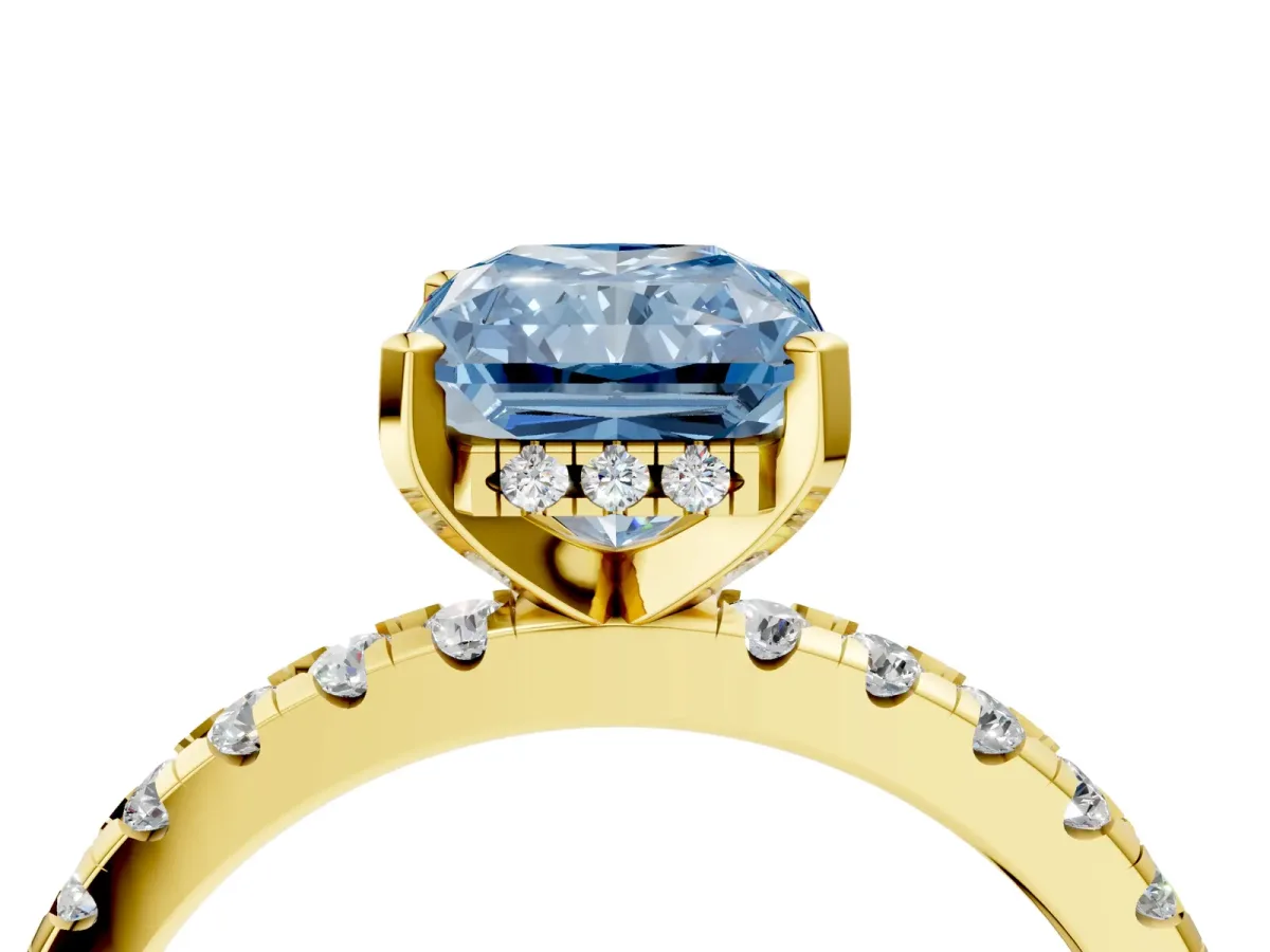 Fancy Blue Radiant Cut Diamond Solitaire Ring with Round Pavé Band and Four-Prong Setting Yellow gold