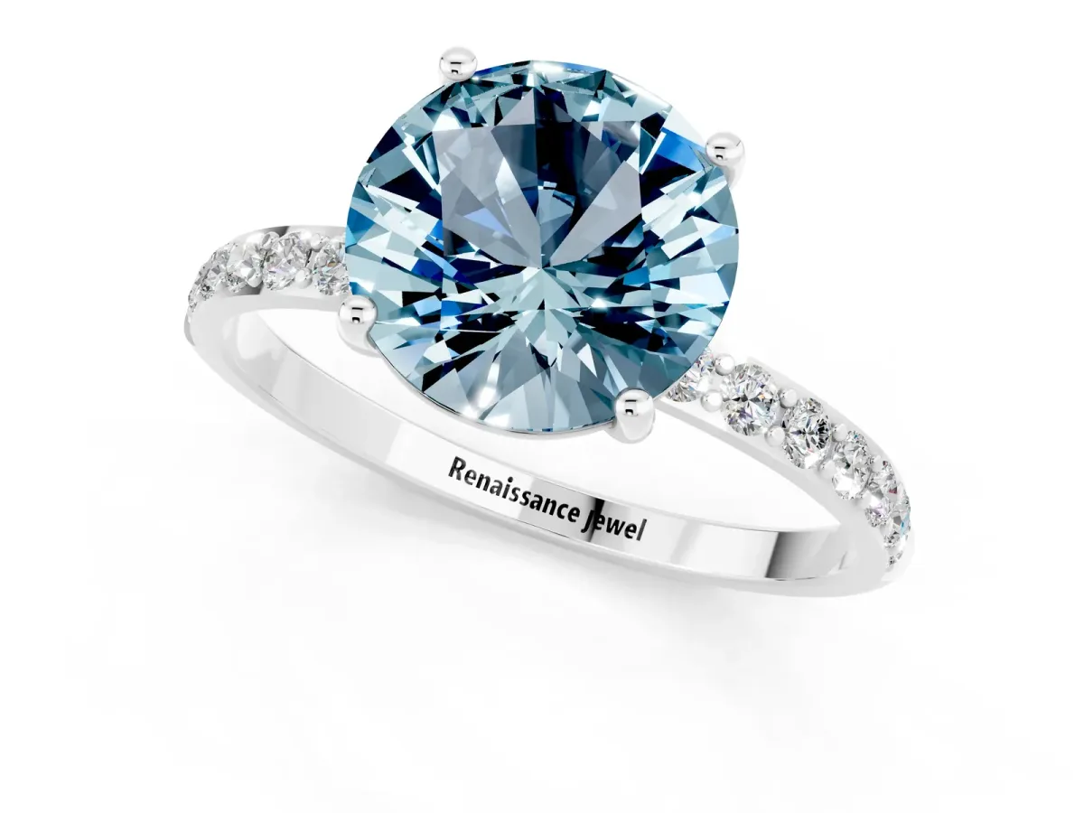Round Cut Aquamarine Solitaire Ring with Round Pavé Band and Prong Setting Platinum