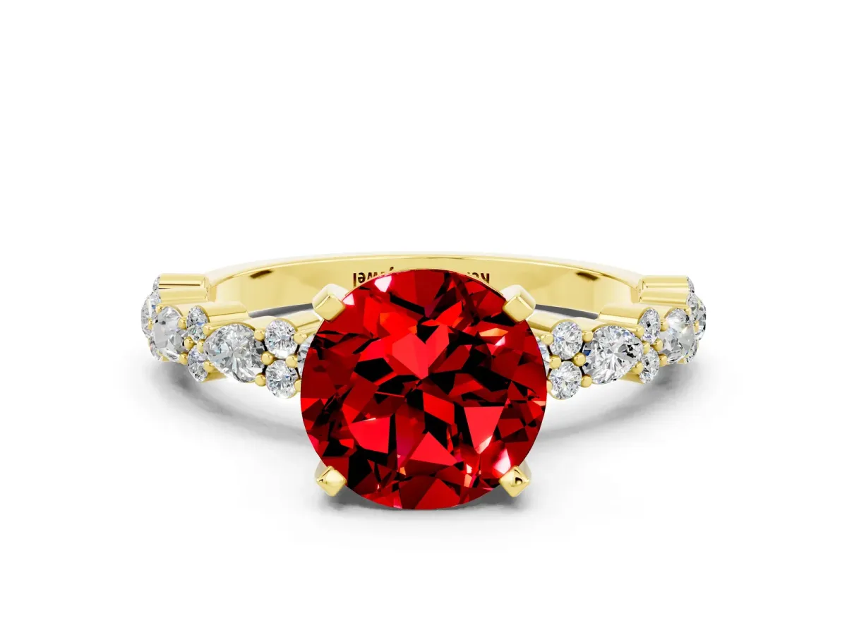 Round Cut Ruby Side Stone Solitaire Ring with Round and Four-Prong Setting Yellow gold
