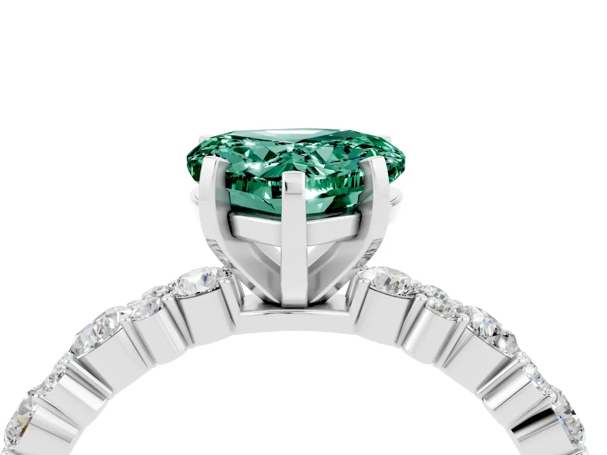 Heart Cut Green Sapphire Side Stone Solitaire Ring with Round and Four-Prong Setting Silver