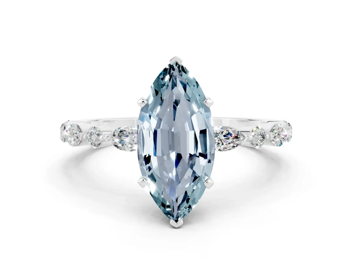 Marquise Cut Aquamarine Ring with Marquise and Round Side Stones and Four-Prong Setting Platinum