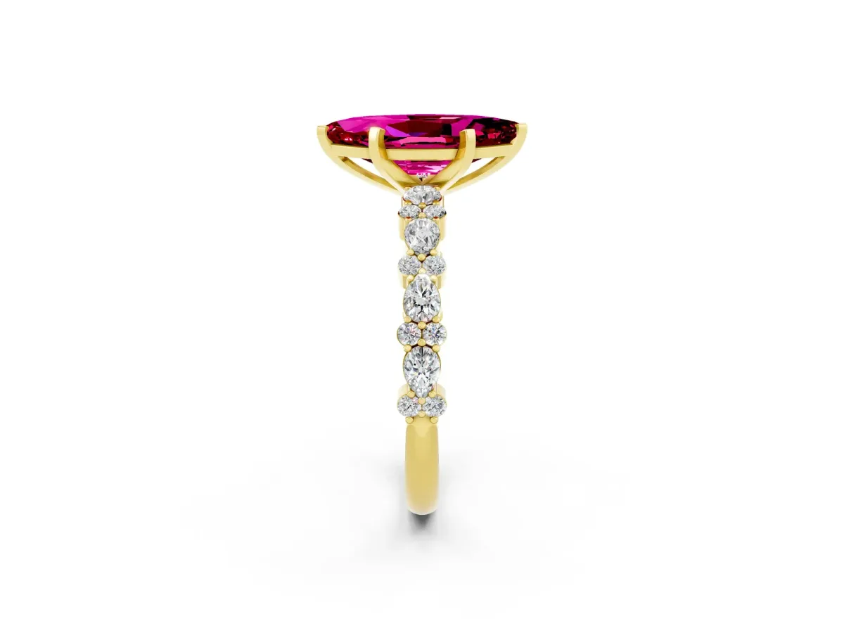 Marquise Cut Garnet Side Stone Solitaire Ring with Round and Four-Prong Setting Yellow gold