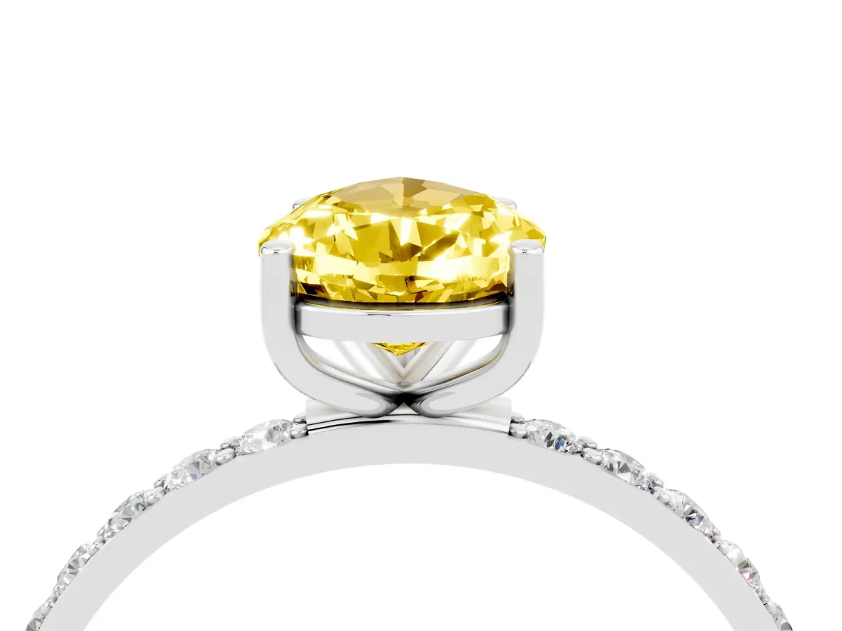Pear Cut Yellow Sapphire Solitaire Ring with Round Pavé Band and Prong Setting Silver