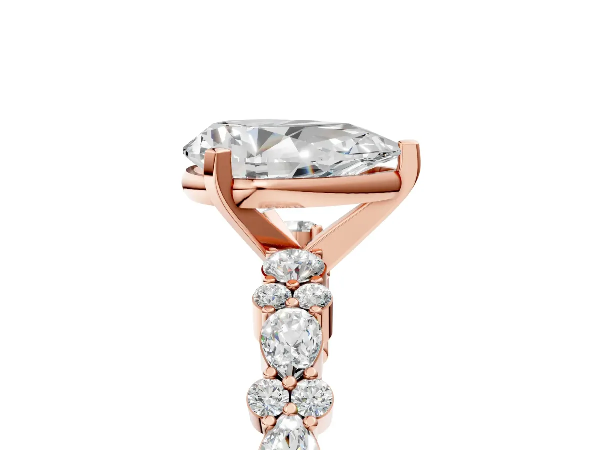 Pear Cut Diamond Side Stone Solitaire Ring with Round Moissanite and Four-Prong Setting Rose gold