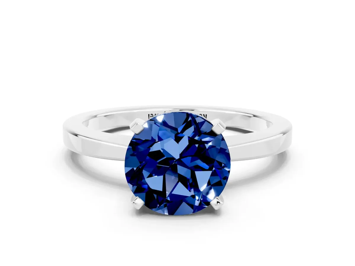 Round Cut Blue Sapphire Solitaire Engagement Ring with Classic Band and Four-Prong Setting Silver