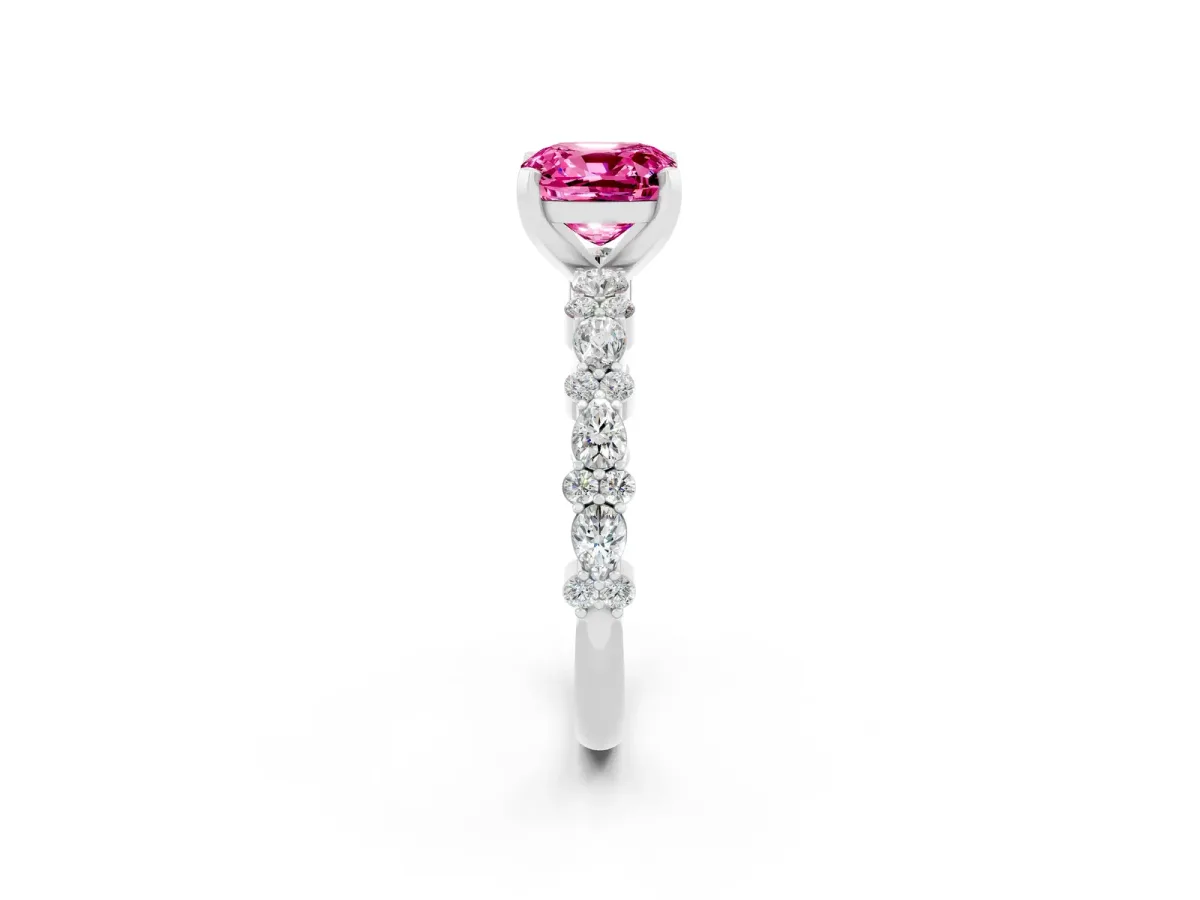 Cushion Cut Pink Sapphire Side Stone Solitaire Ring with Round and Four-Prong Setting Platinum