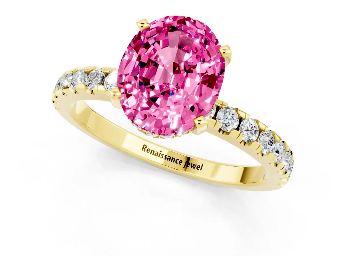 Oval Cut Pink Sapphire Solitaire Ring with Round Pavé Band and Four-Prong Setting Yellow gold