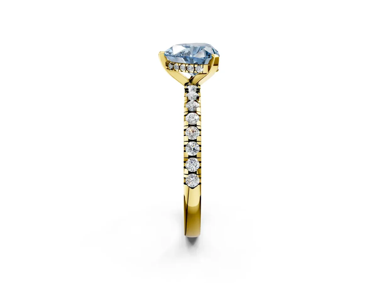 Fancy Blue Heart Cut Diamond Solitaire Ring with Round Pavé Band and Four-Prong Setting Yellow gold