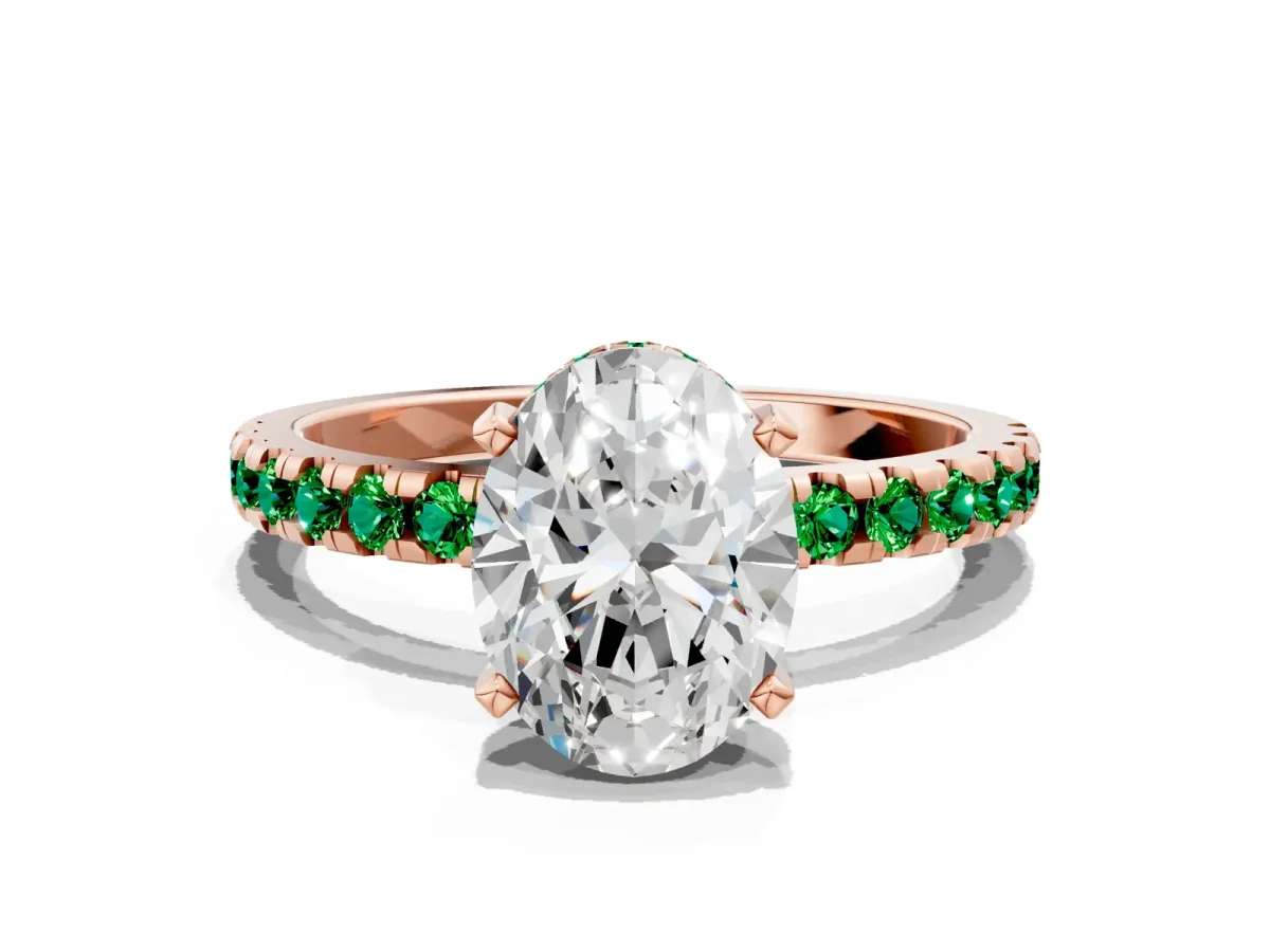 Oval Cut Diamond Solitaire Ring with Round Emerald Pavé Band and Four-Prong Setting Rose gold
