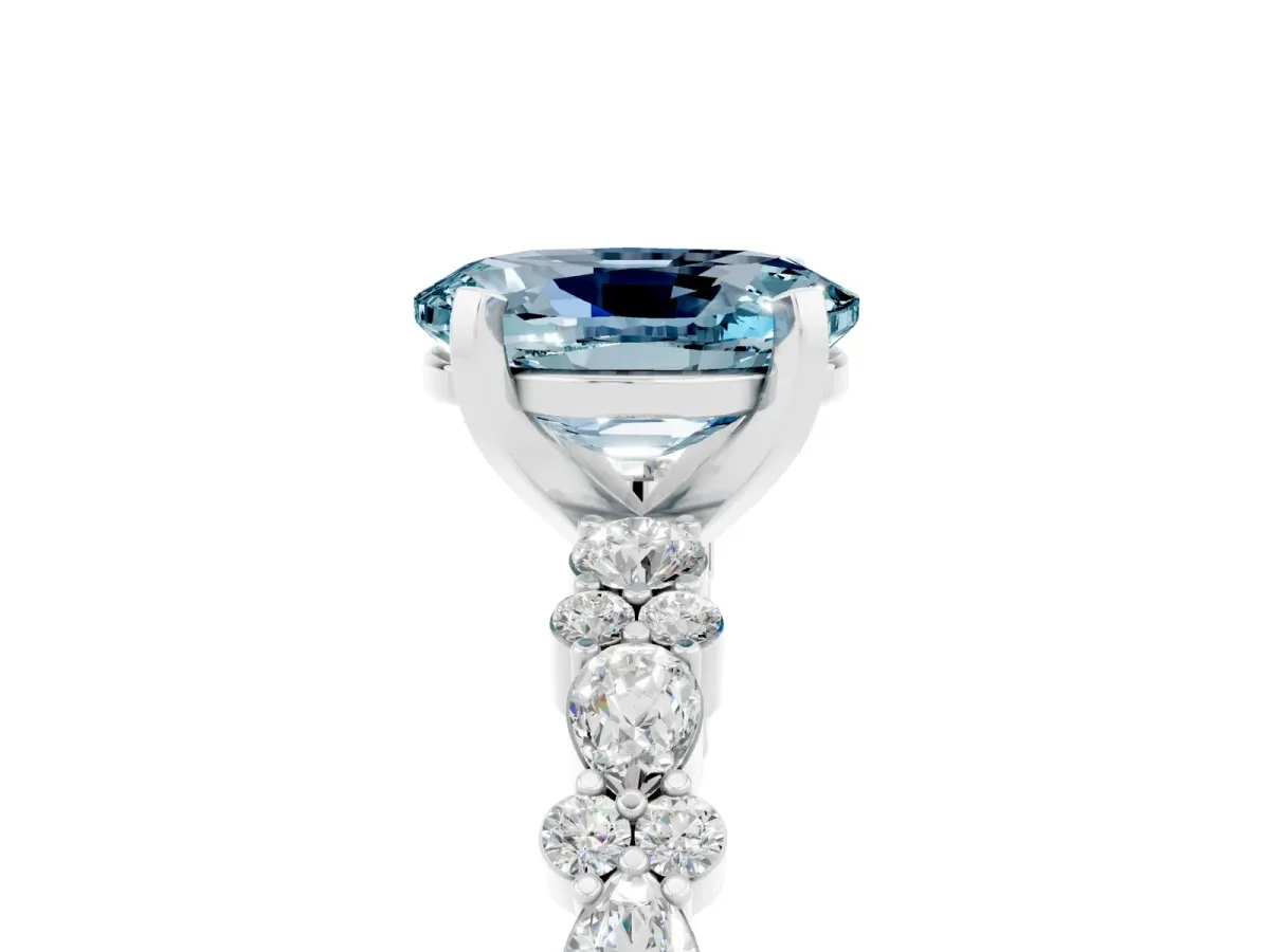 Oval Cut Aquamarine Side Stone Solitaire Ring with Round and Four-Prong Setting White gold