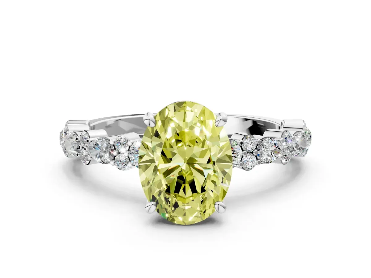 Fancy Yellow Oval Cut Diamond Side Stone Solitaire Ring with Round and Four-Prong Setting Platinum