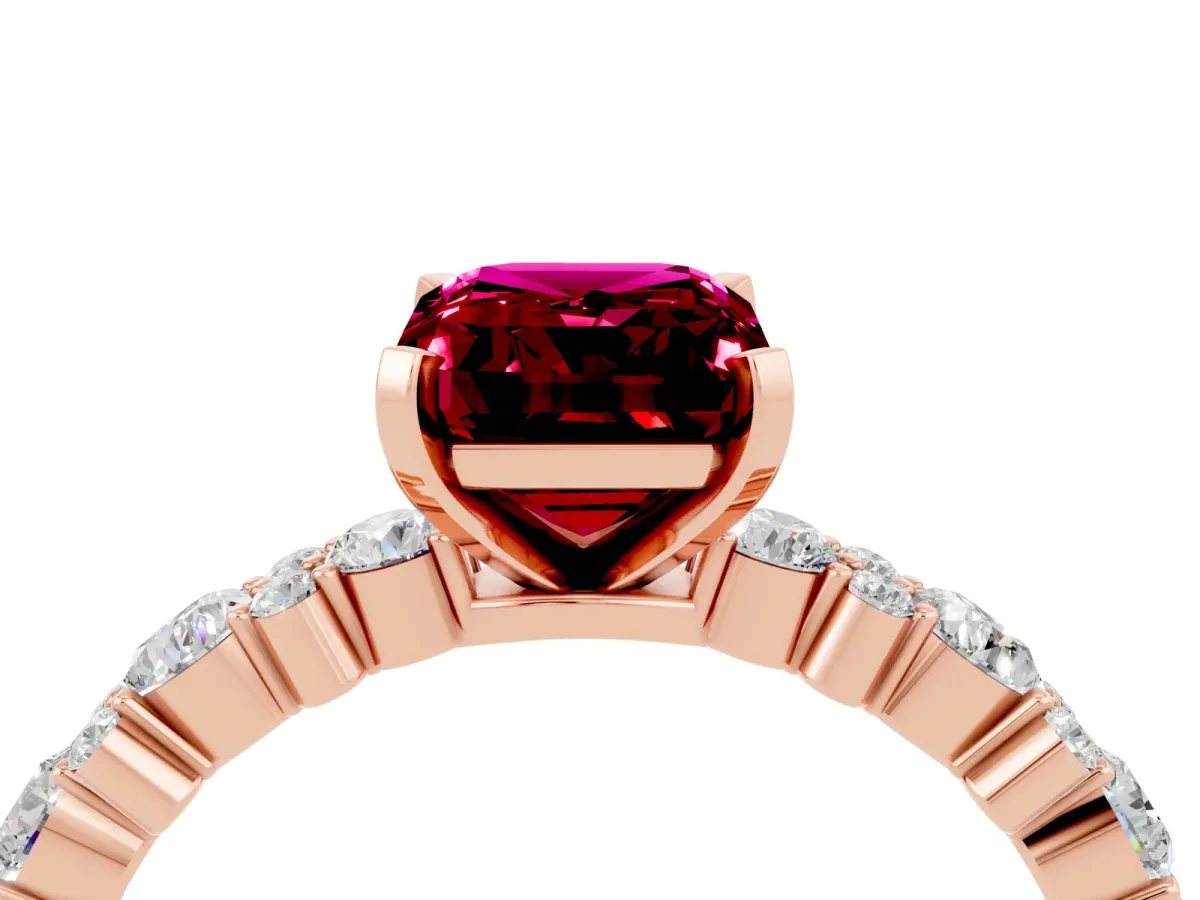 Emerald Cut Garnet Side Stone Solitaire Ring with Round and Four-Prong Setting Rose gold