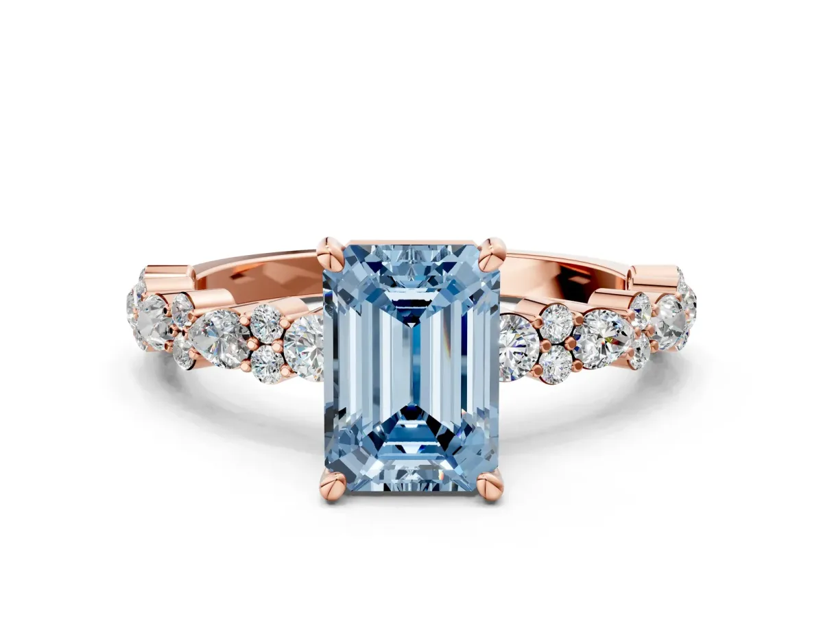 Fancy Blue Emerald Cut Diamond Side Stone Solitaire Ring with Round and Four-Prong Setting Rose gold
