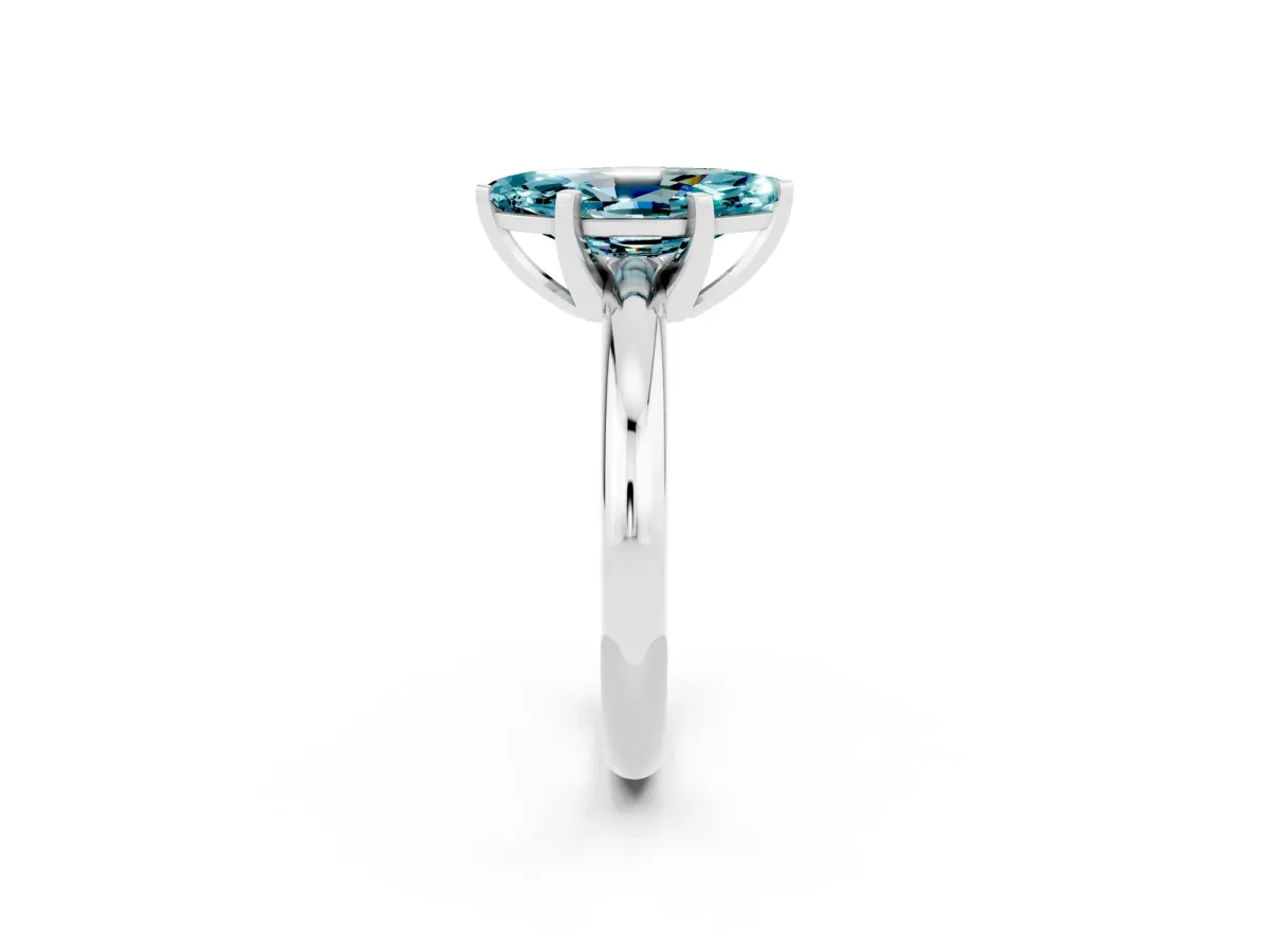 Marquise Cut Blue Topaz Solitaire Engagement Ring with Round Band and Four-Prong Setting Silver