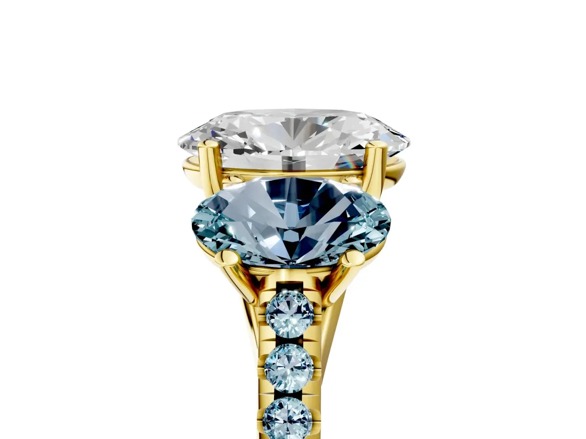 Three-Stone Oval Cut Diamond Ring with Round Aquamarine Pavé Band and Prong Setting Yellow gold