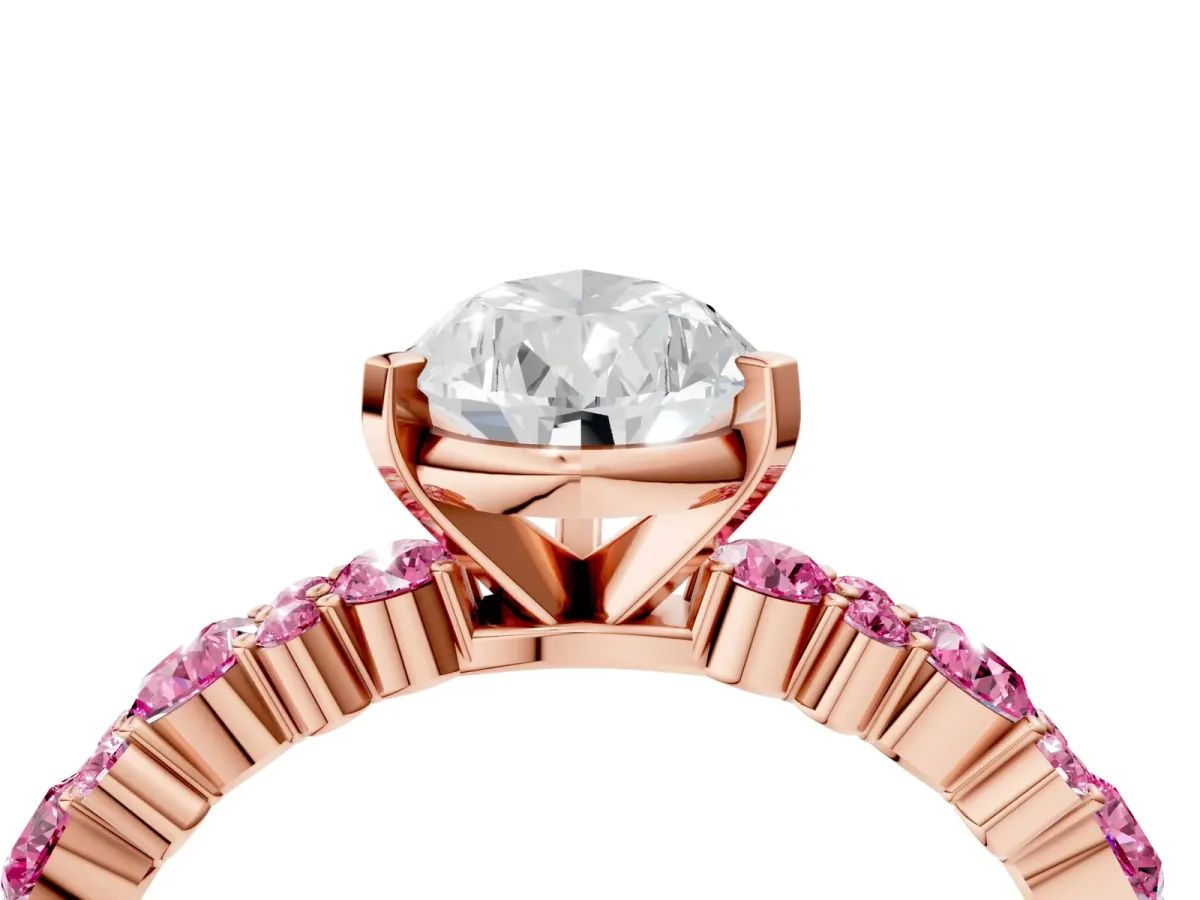 Pear Cut Diamond Side Stone Solitaire Ring with Round Pink Sapphire and Four-Prong Setting Rose gold