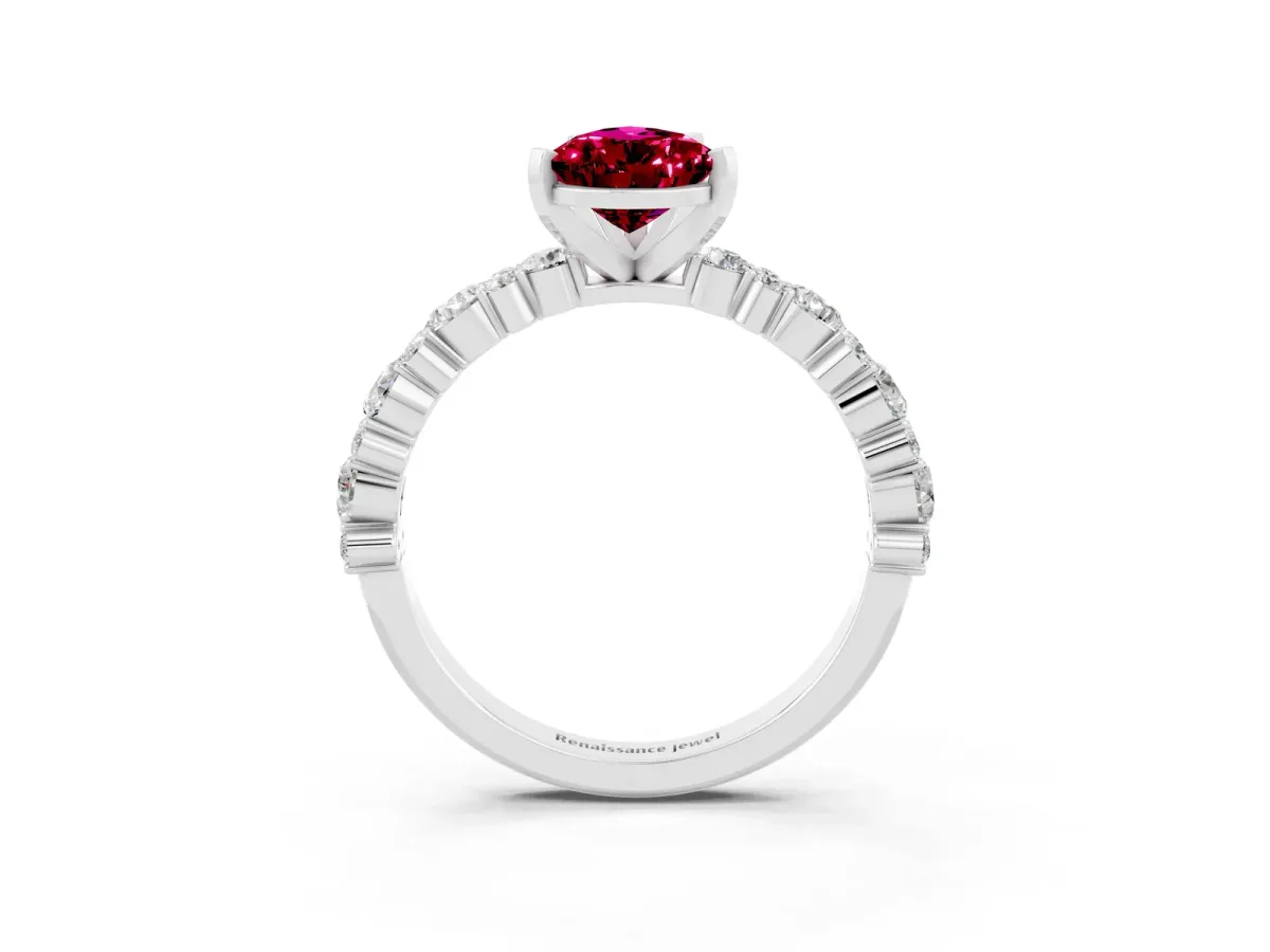 Pear Cut Garnet Side Stone Solitaire Ring with Round and Four-Prong Setting Silver