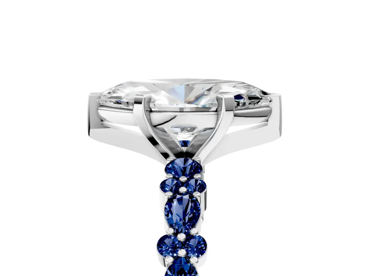 Marquise Cut Diamond Side Stone Solitaire Ring with Round Blue Sapphire and Four-Prong Setting White gold
