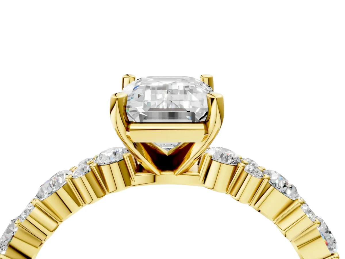 Emerald Cut Diamond Side Stone Solitaire Ring with Round Moissanite and Four-Prong Setting Yellow gold