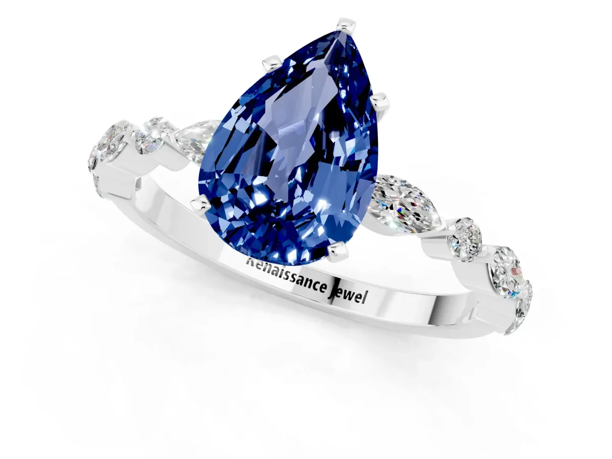Pear Cut Blue Sapphire Ring with Marquise and Round Side Stones and Four-Prong Setting Silver