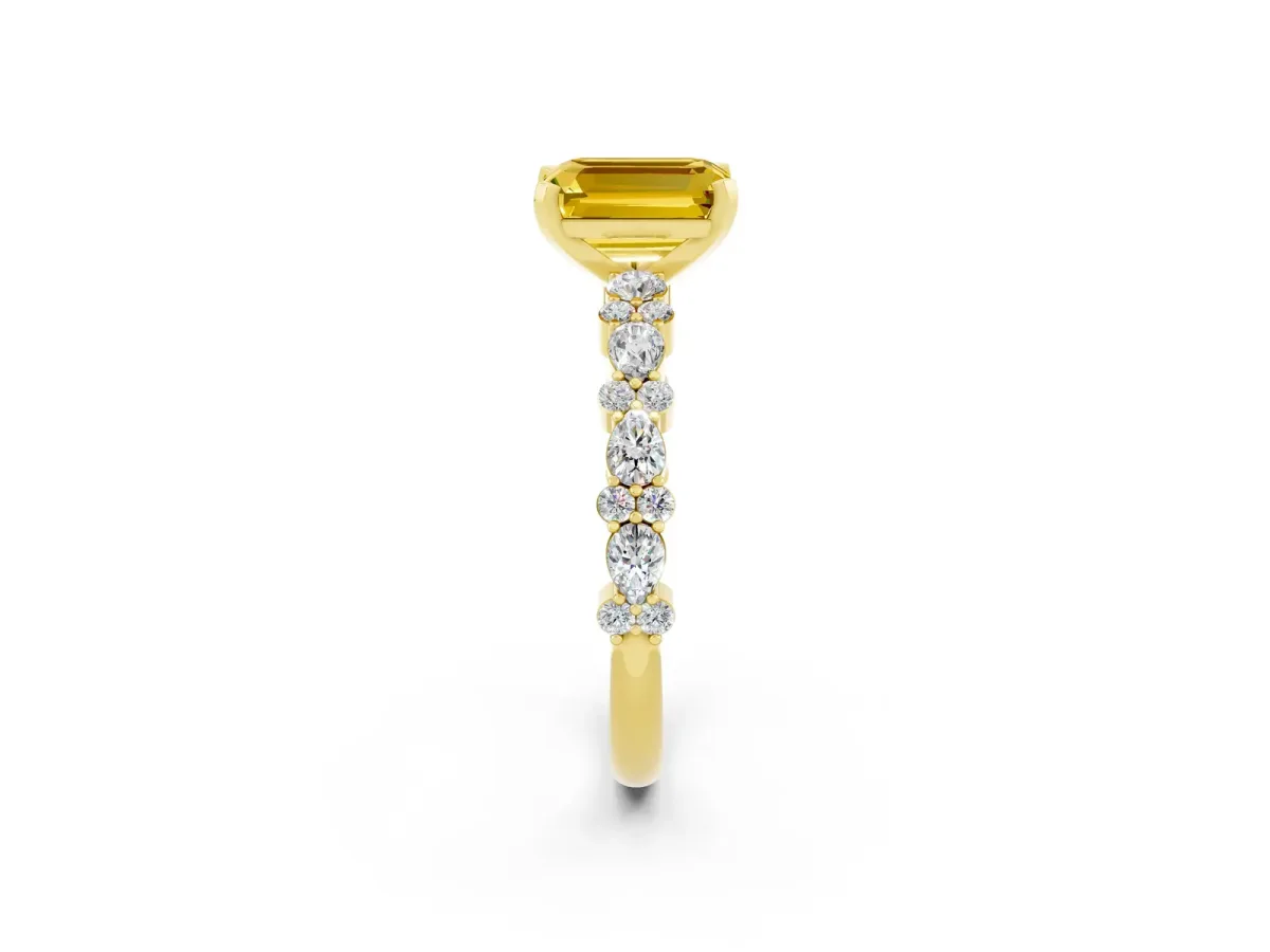 Emerald Cut Yellow Sapphire Side Stone Solitaire Ring with Round and Four-Prong Setting Yellow gold