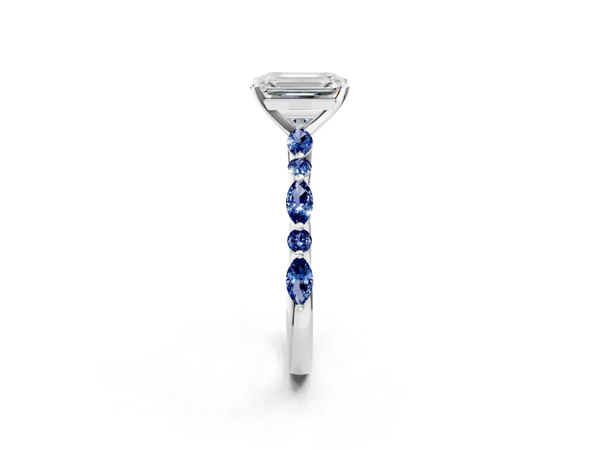Emerald Cut Diamond Ring with Marquise and Round Blue Sapphire Side Stones and Four-Prong Setting Silver