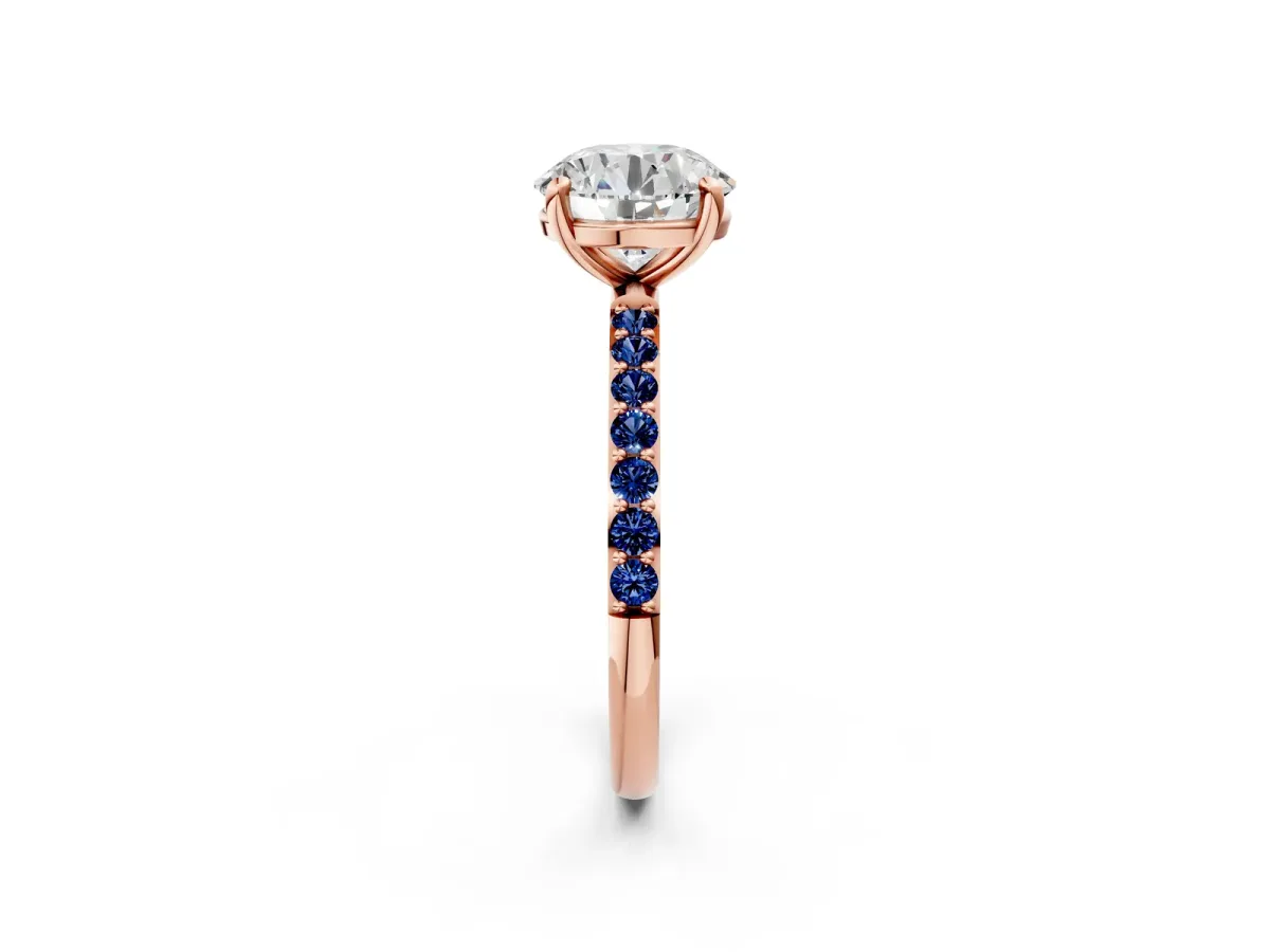 Round Cut Diamond Solitaire Ring with Round Blue Sapphire Pavé Band and Prong Setting Rose gold