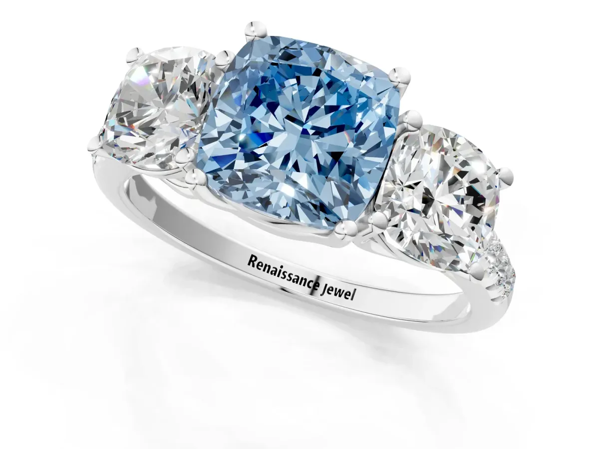 Fancy Blue Three-Stone Cushion Cut Diamond Ring with Round Pavé Band and Prong Setting White gold