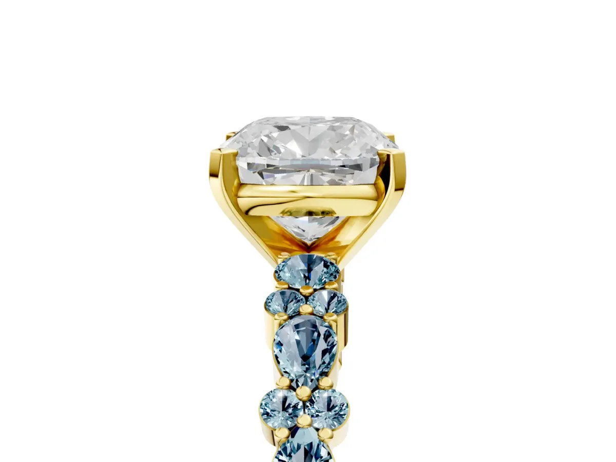 Cushion Cut Diamond Side Stone Solitaire Ring with Round Aquamarine and Four-Prong Setting Yellow gold