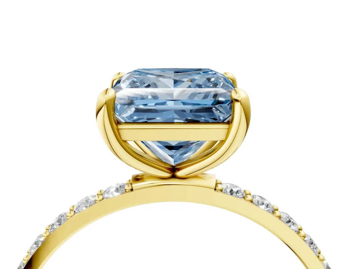 Fancy Blue Princess Cut Diamond Solitaire Ring with Round Pavé Band and Prong Setting Yellow gold