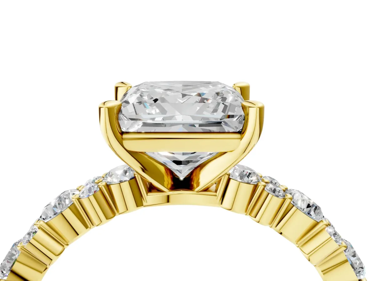 Princess Cut Diamond Side Stone Solitaire Ring with Round and Four-Prong Setting Yellow gold