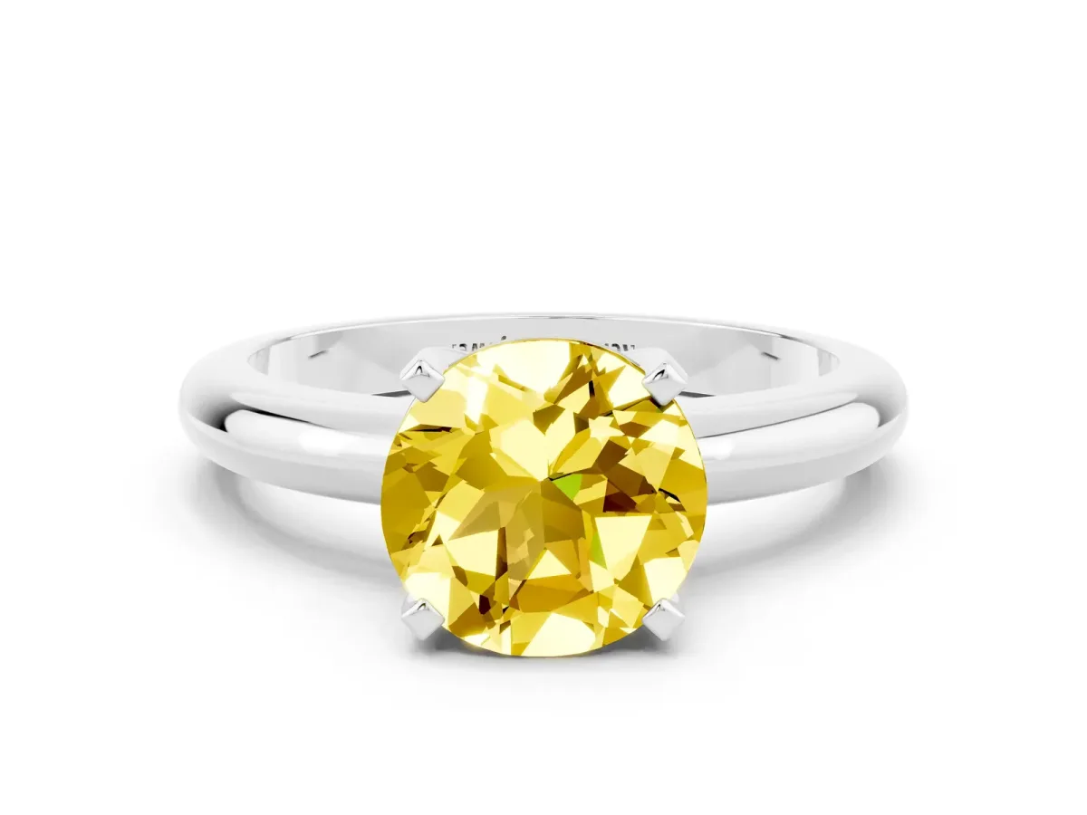 Round Cut Yellow Sapphire Solitaire Engagement Ring with Round Band and Four-Prong Setting Silver
