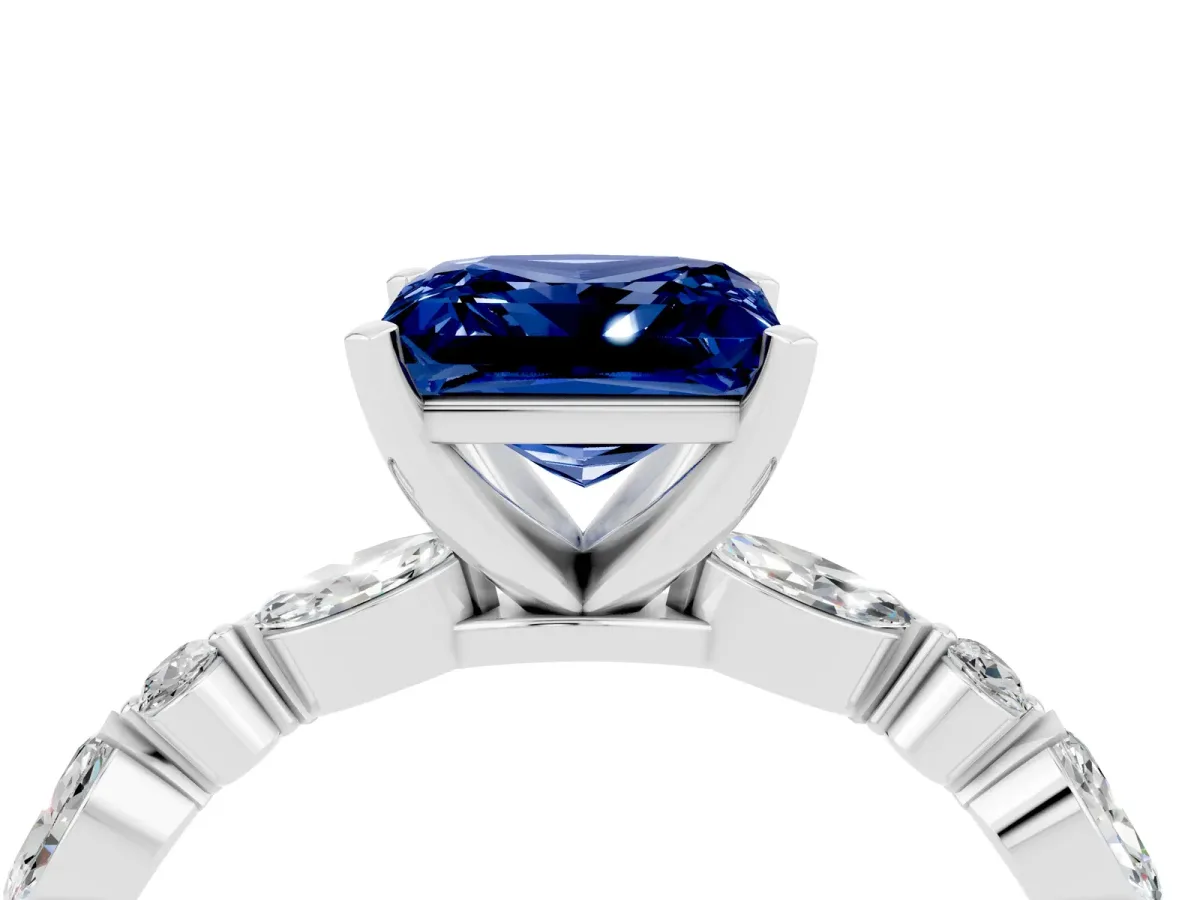 Princess Cut Blue Sapphire Ring with Marquise and Round Side Stones and Four-Prong Setting Silver