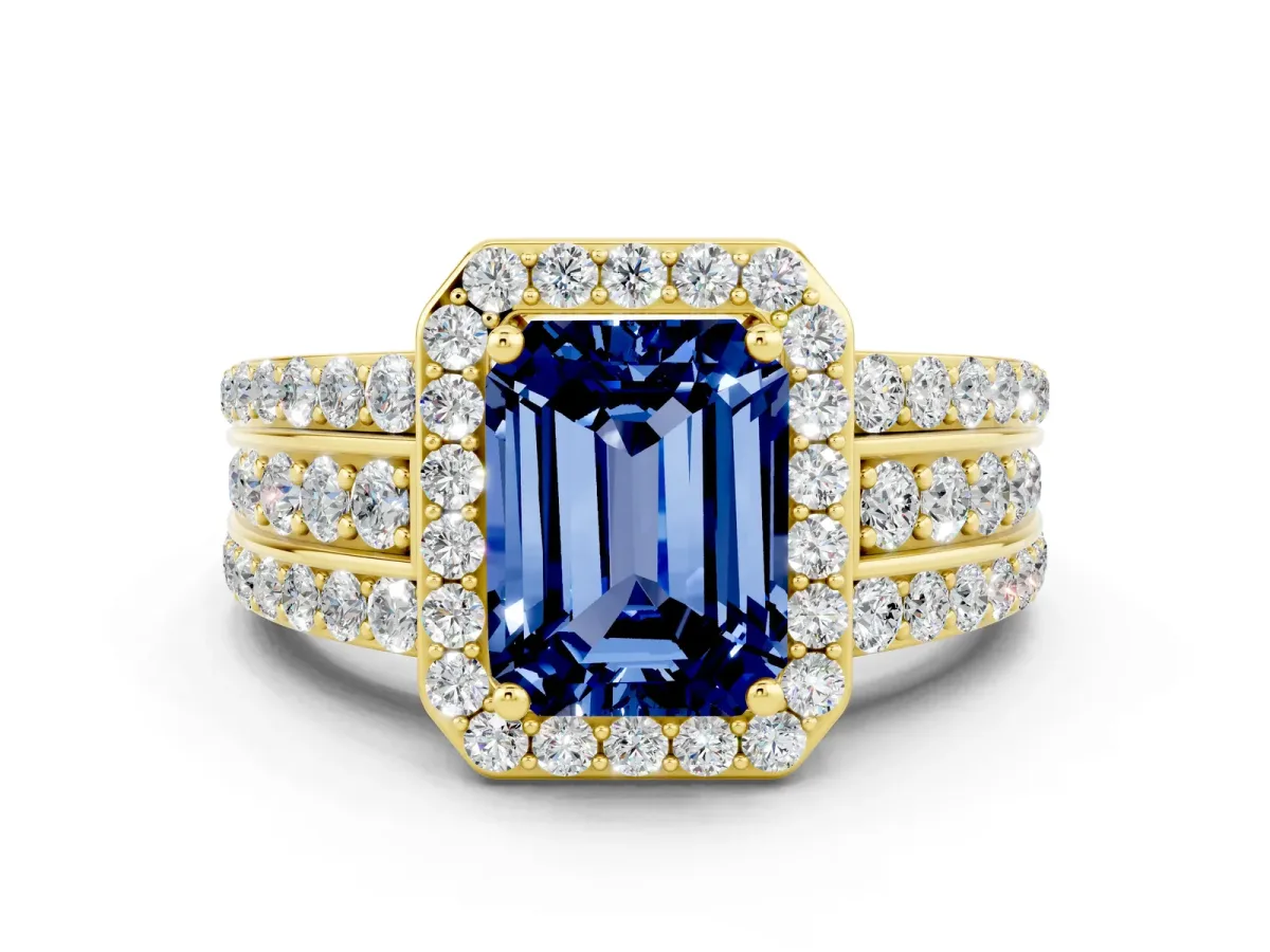 Emerald Cut Halo Blue Sapphire Ring with Round Split Shank and Prong Setting Yellow gold