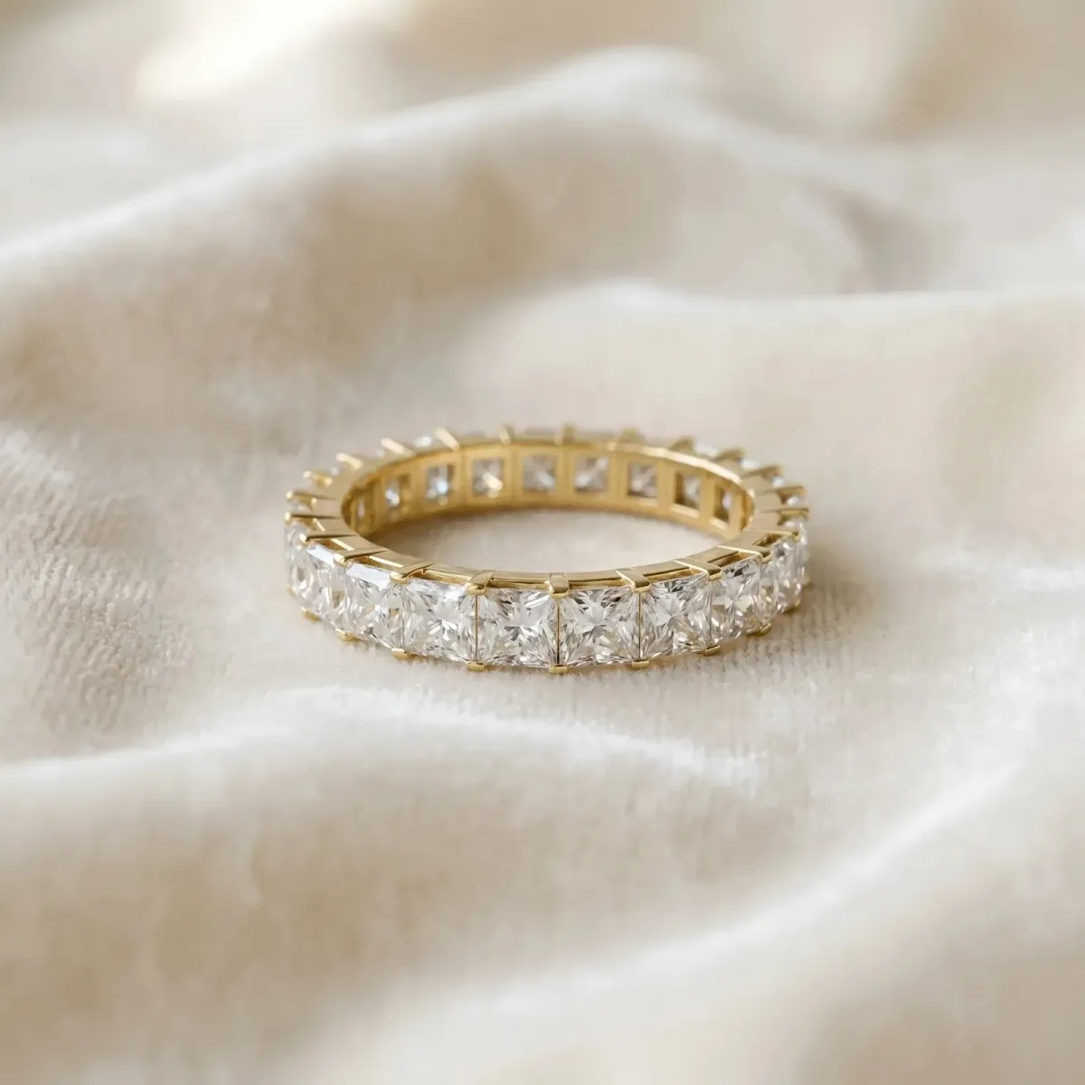 Princess Cut Diamond Eternity Band with Channel Setting and Shared Prong Yellow gold