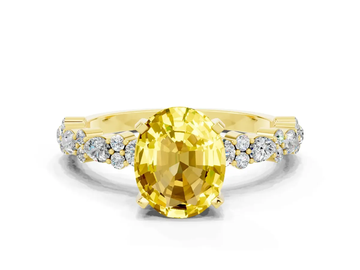 Oval Cut Yellow Sapphire Side Stone Solitaire Ring with Round and Four-Prong Setting Yellow gold