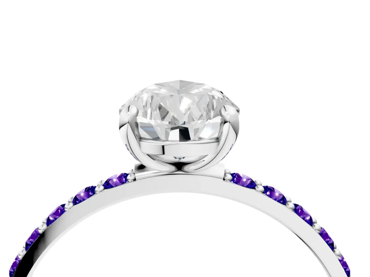 Pear Cut Diamond Solitaire Ring with Round Tanzanite Pavé Band and Prong Setting Platinum