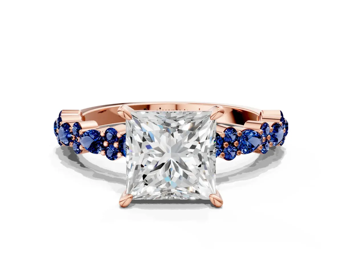 Princess Cut Diamond Side Stone Solitaire Ring with Round Blue Sapphire and Four-Prong Setting Rose gold