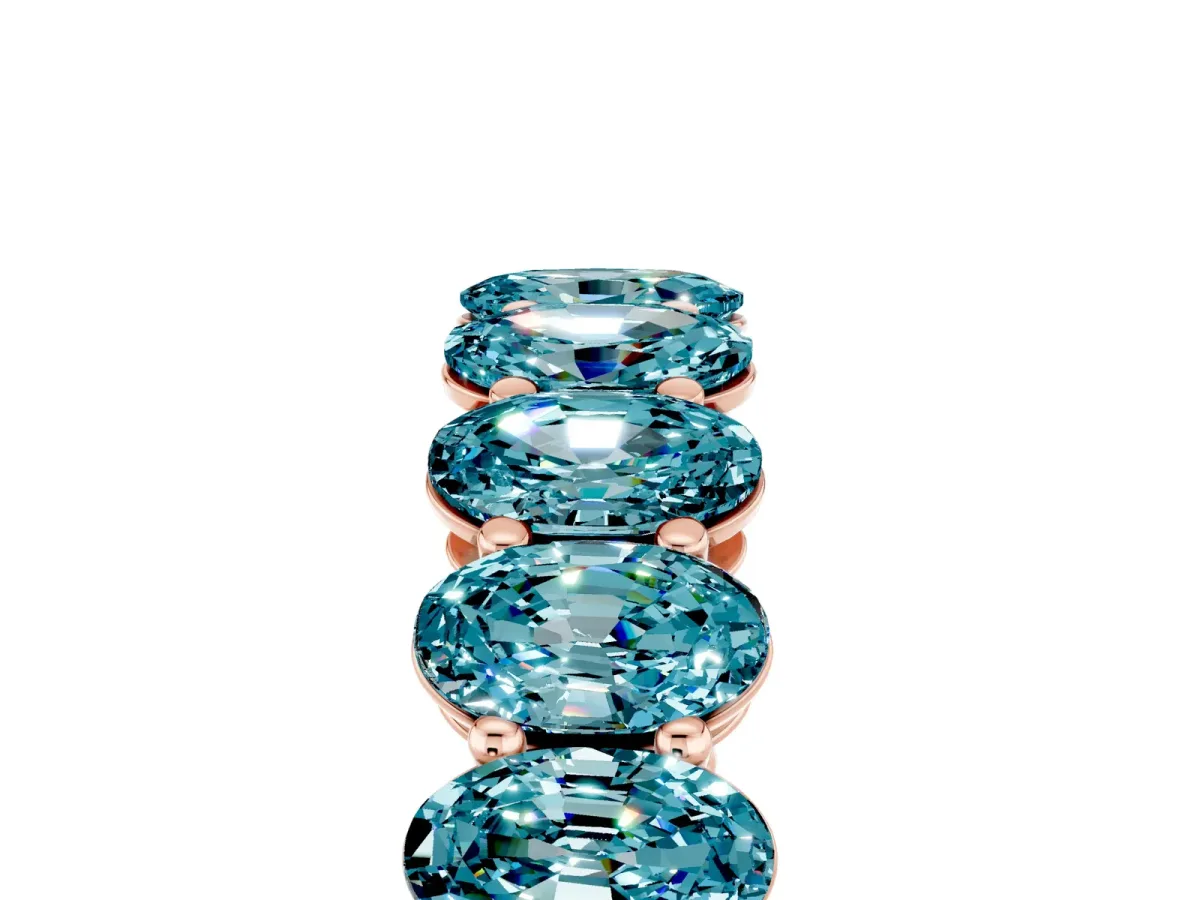 Oval Cut Blue Topaz Eternity Band with Shared Prong Setting Rose gold