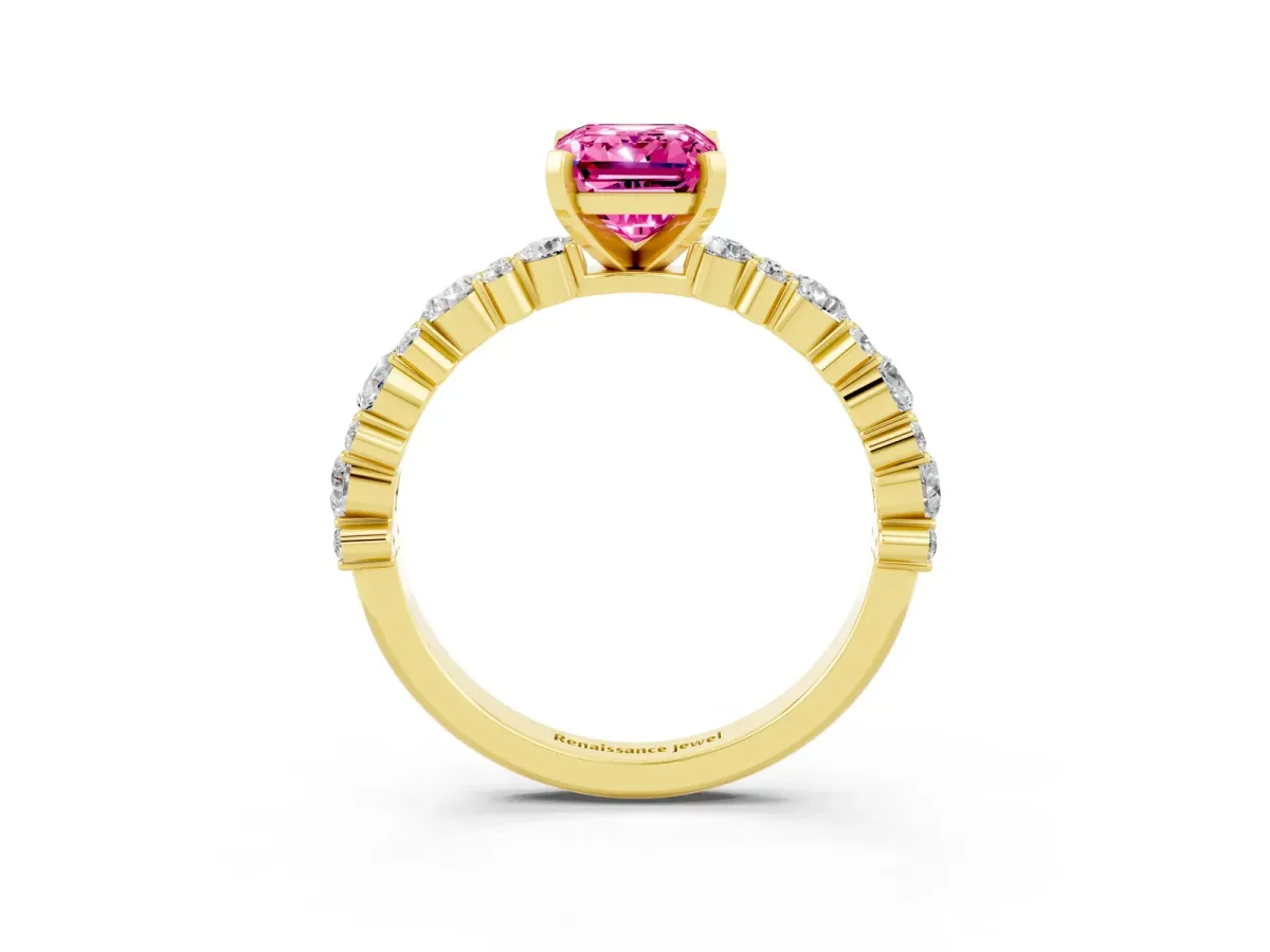 Emerald Cut Pink Sapphire Side Stone Solitaire Ring with Round and Four-Prong Setting Yellow gold