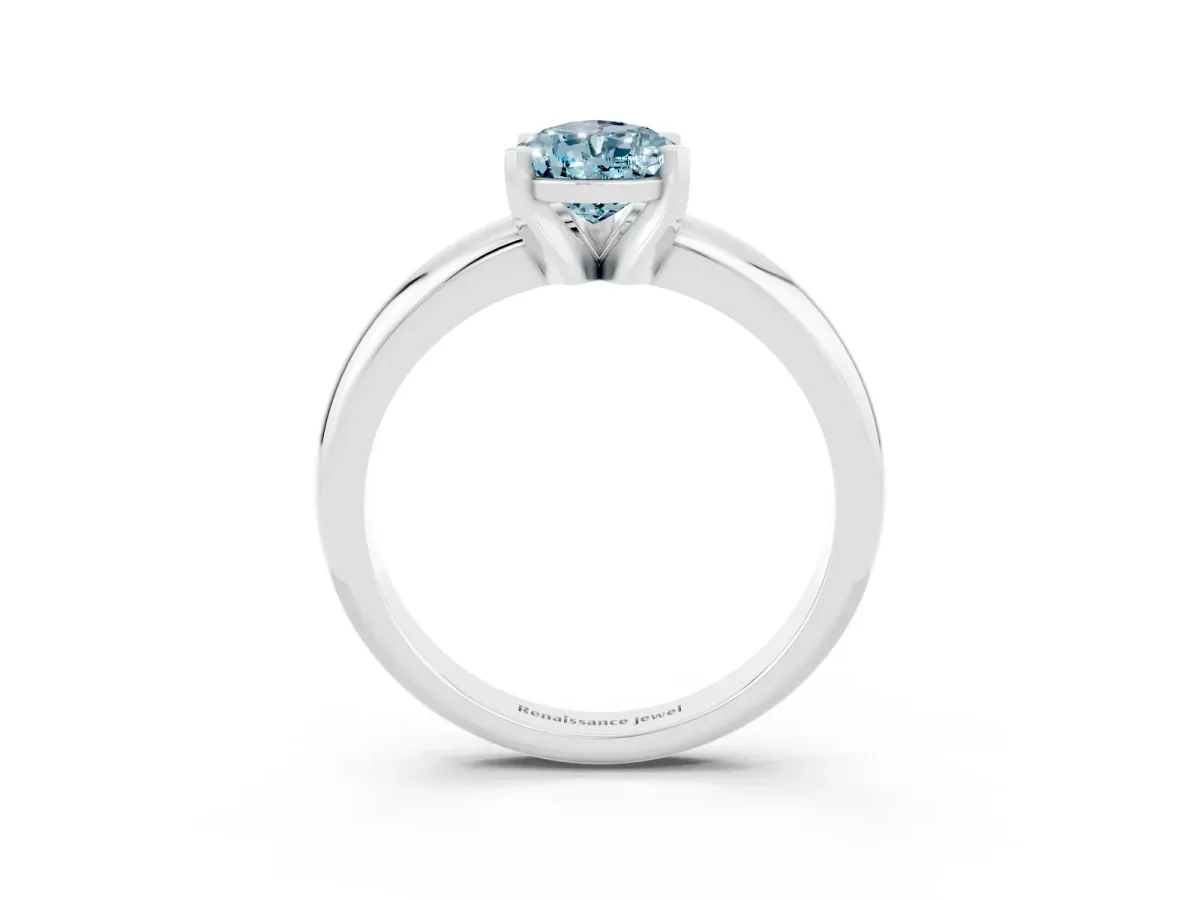 Pear Cut Aquamarine Solitaire Engagement Ring with Round Band and Four-Prong Setting Silver