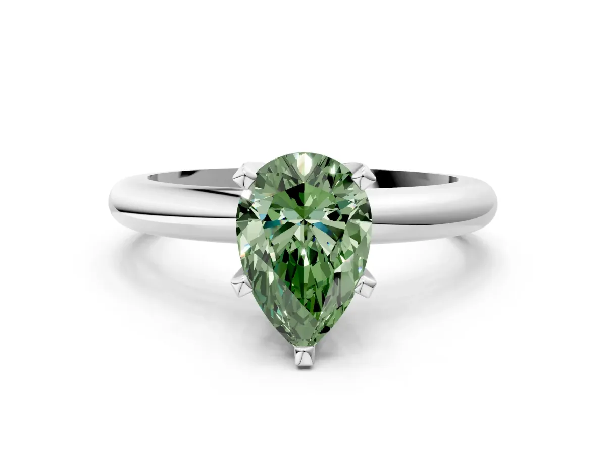 Fancy Green Pear Cut Diamond Solitaire Engagement Ring with Round Band and Four-Prong Setting Silver