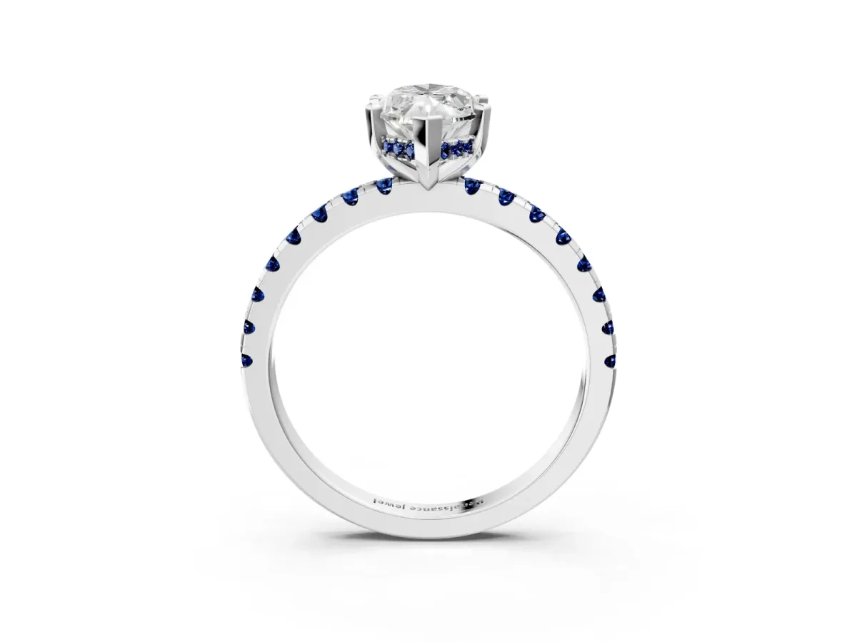 Marquise Cut Diamond Solitaire Ring with Round Blue Sapphire Pavé Band and Four-Prong Setting Silver