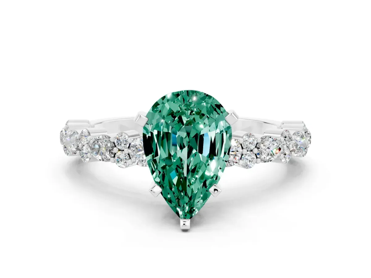 Pear Cut Green Sapphire Side Stone Solitaire Ring with Round and Four-Prong Setting White gold