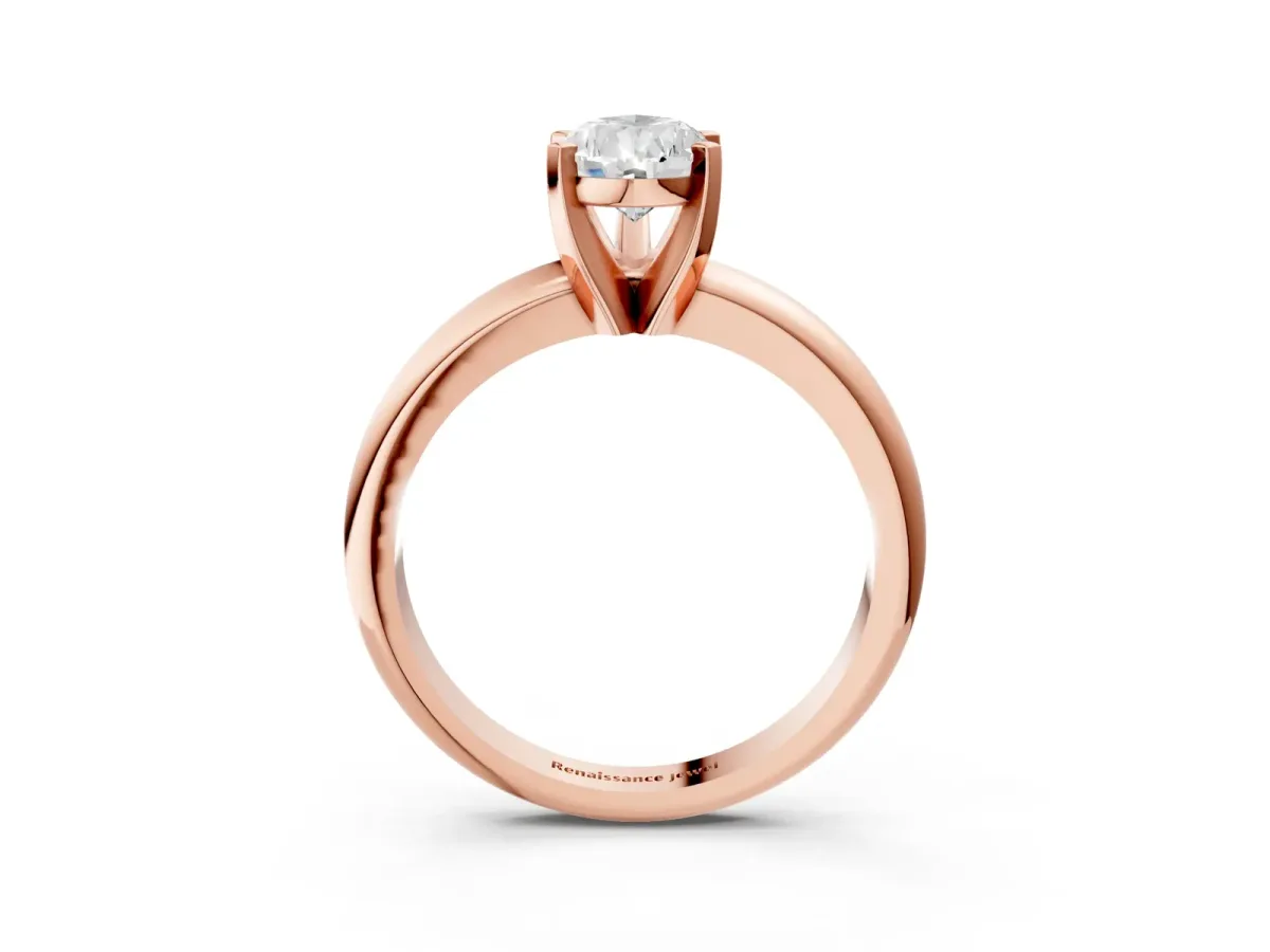 Pear Cut Diamond Solitaire Engagement Ring with Round Band and Four-Prong Setting Rose gold
